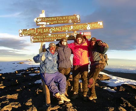 Micha & Jaffa Feiberg at the summit of Kilimanjaro, 7summits.com expeditions