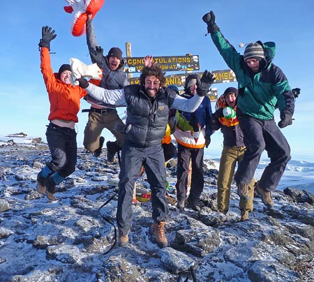Cameron Bass and friends on the summit of Kilimanjaro, 7summits.com Expeditions