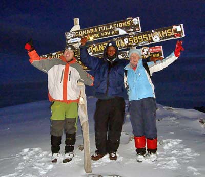 Barbara McElvaney on the summit of Kilimanjaro, Tanzania, on 7summits.com Expeditions