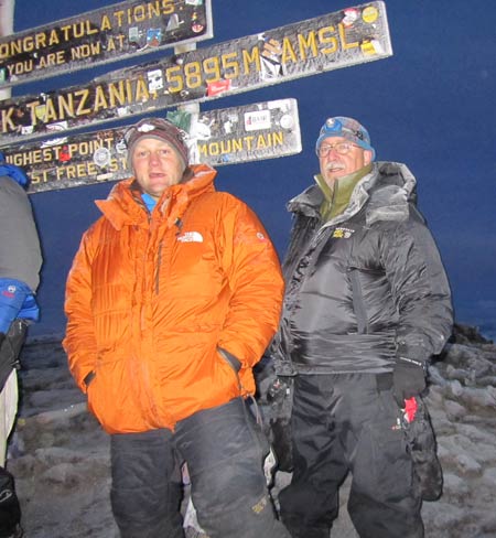 Marc Whittier on the summit of Kilimanjaro, 7summits.com Expeditions