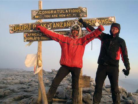 Jeroen, Feitze, Baba yetu & Thomas at the summit of Kilimanjaro, 7summits.com expeditions