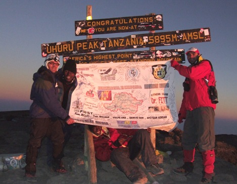 Ovidiu japan Cismas on teh summit of Kilimanjaro, 7summits.com Expeditions